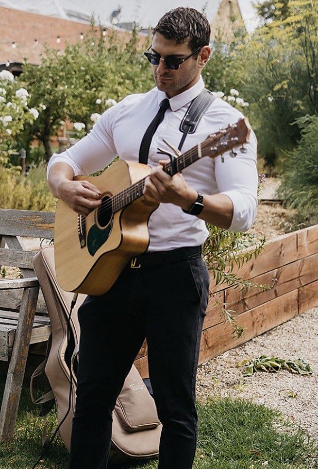 Live acoustic performer playing guitar at an Adelaide wedding, Double Trouble Entertainment