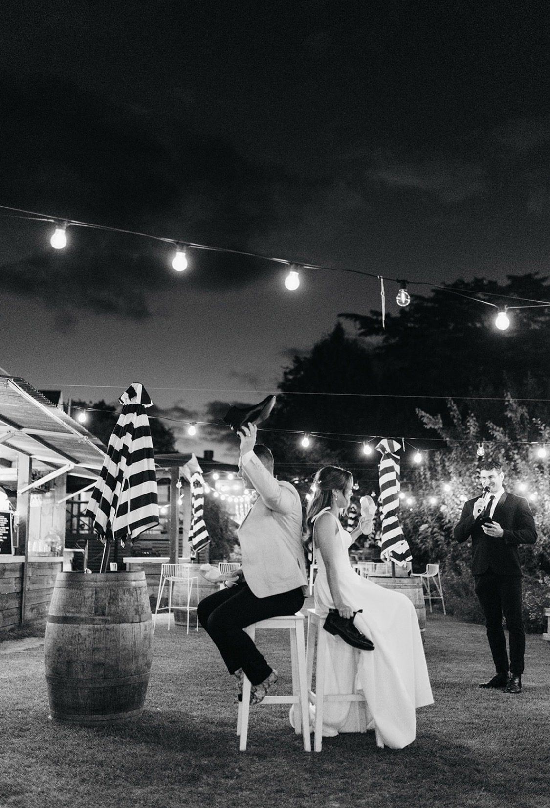 Jesse, founder of Double Trouble Entertainment, MCing an outdoor Adelaide wedding reception